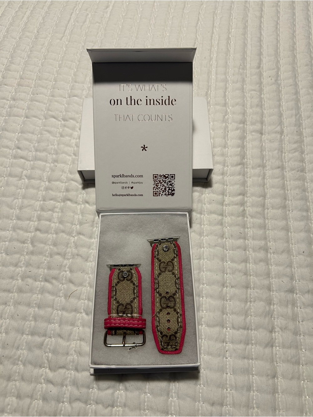 Spark*l Apple Watch band. Tan/brown monogram, hot pink trim, crystal studs